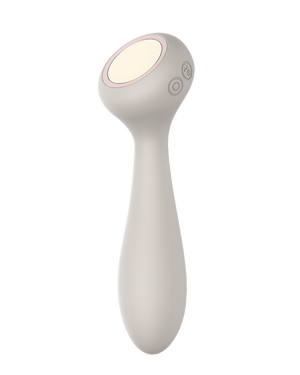 Sol - Naago. Heated-tip vibrator with dual ends for clitoral stimulation and warming touch shown upright on white